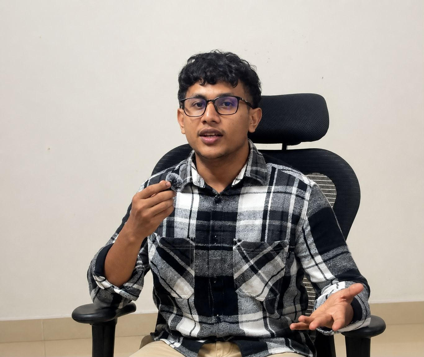 A team member speaking into a microphone at the office